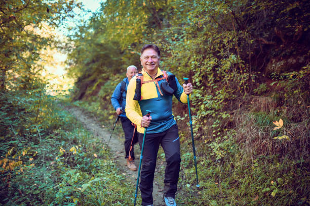 istock Smiling Senior Male Hiker Happy While Enjoying Favorite Activity 1602858899