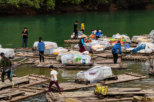 The transport with raft on the Song Quay Son River at Ban Gioc Detian Waterfalls in Vietnam and China, 17. November 2019