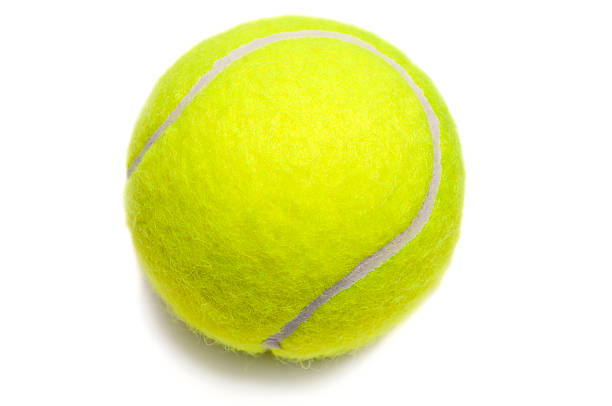 isolated yellow tennis ball - tennisbal stockfoto's en -beelden
