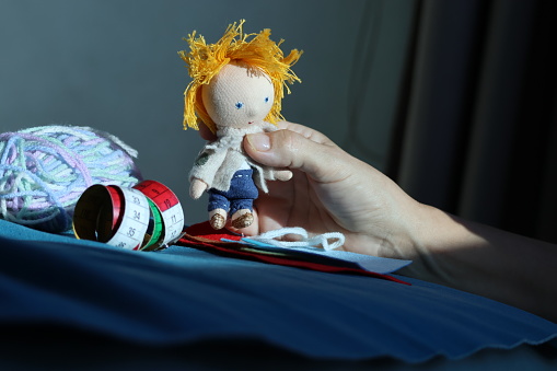 hobby of sewing textile dolls