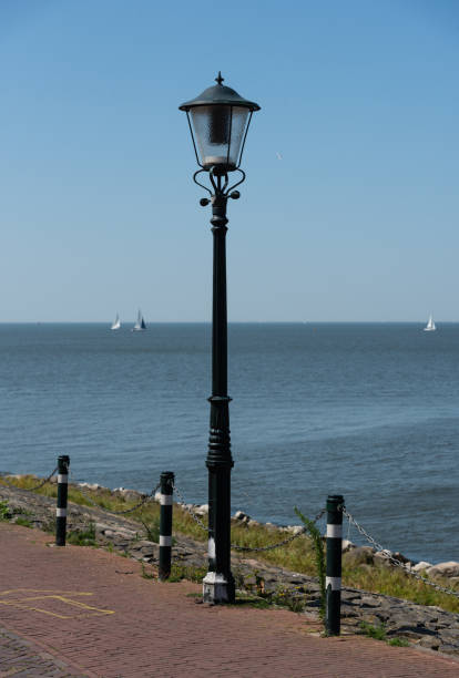 vintage streetlight on the coast of the lake