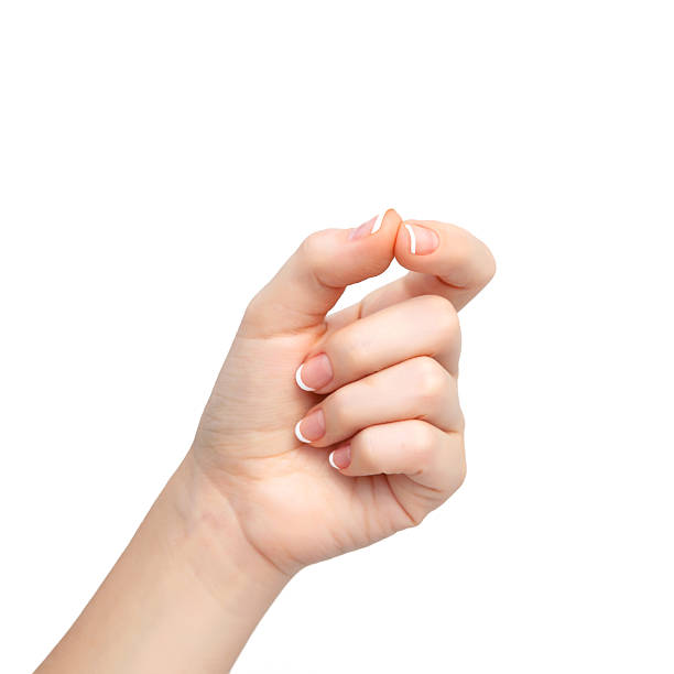 istock woman hand on isolated background holding an object 160294960