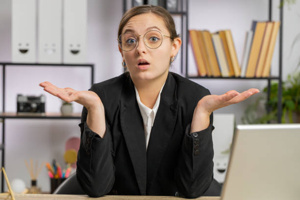 istock Confused businesswoman embarrassed about ambiguous question, having doubts, no answer idea, clueless 1602961784