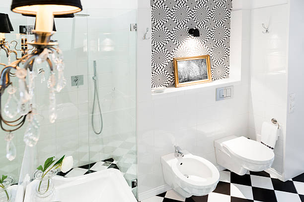 Stylish black and white bathroom interior with checkered patterns stock photo