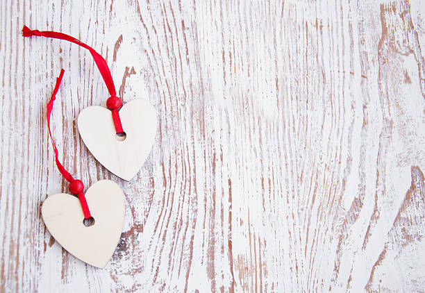 istock Hearts on wooden background 160298269