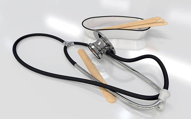 istock Stethoscope with wooden tongue depressor 160298645