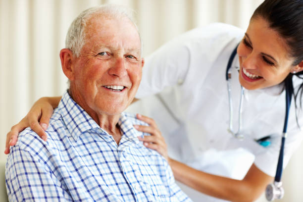 istock Happy senior man and doctor 160298739