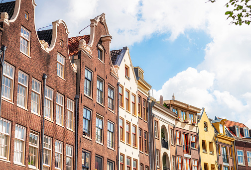 Traditional Dutch apartment buildings in the heart of Amsterdam, Holland.