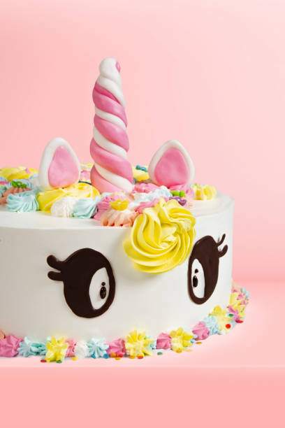 istock Unicorn cake on pink background. 1602994456
