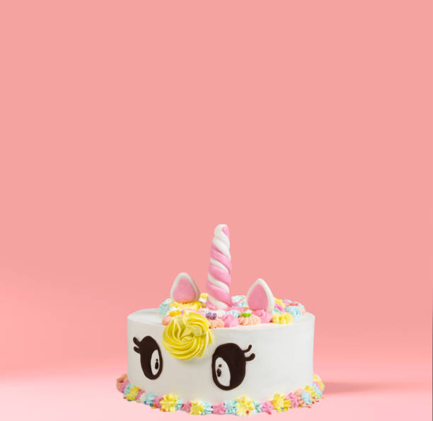 istock Unicorn cake on pink background. 1602994458