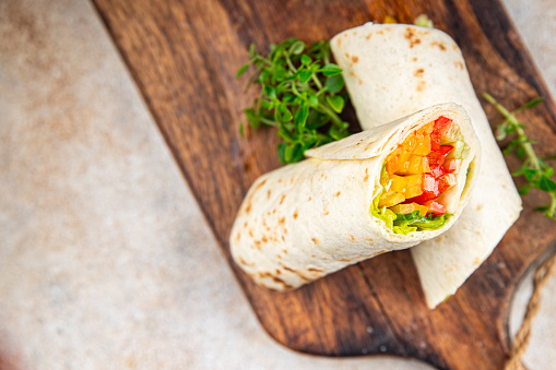 vegetable tortilla shawarma with vegetables healthy meal food snack on the table copy space
