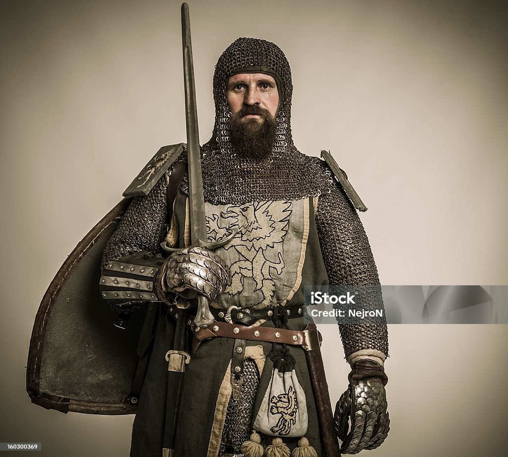 Medieval knight with sword and shield Knight - Person Stock Photo