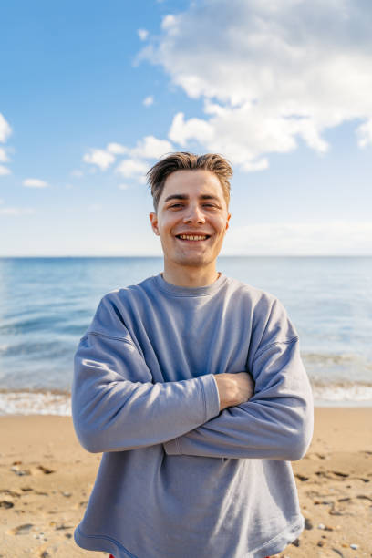 istock Young Man On The Beach In Greece 1603027680