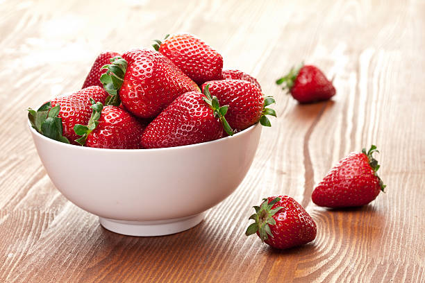 istock Strawberries on a wooden table. 160302870