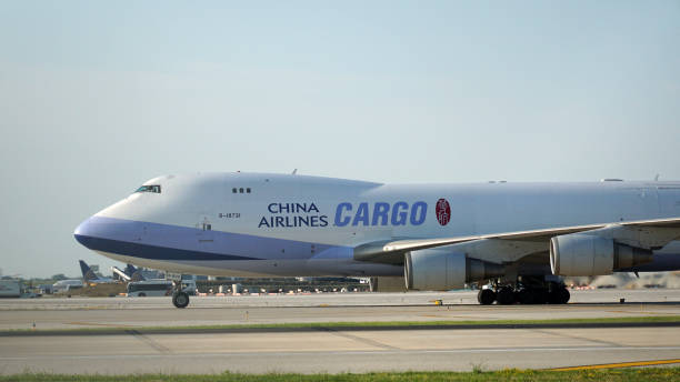 china airlines cargo plane taxies on the runway - dhl airplane freight transportation boeing imagens e fotografias de stock