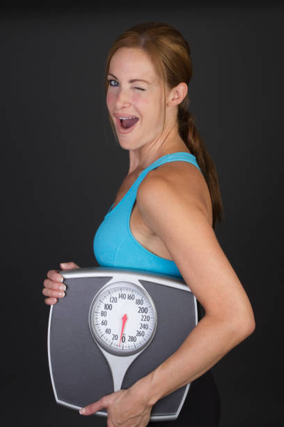 istock fit woman winking 160306057