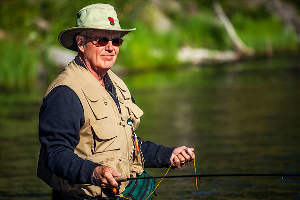 Fly Fisherman Waits for a Strike stock photo