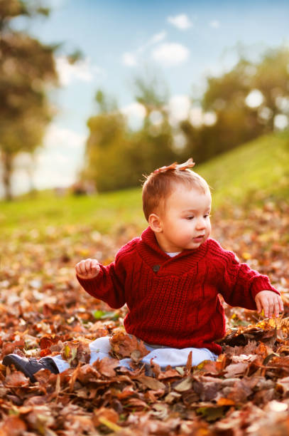 istock little baby boy playing in the nature 160306897