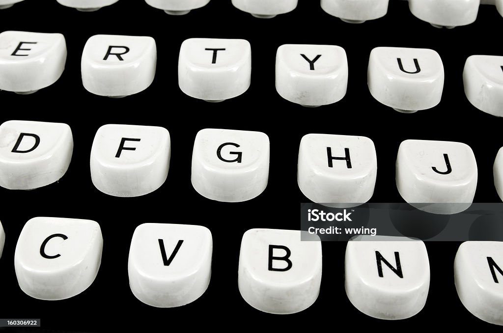 Retro Typewriter Keys Close-up of a section of a 1940s typewriter keyboard. Antique Stock Photo