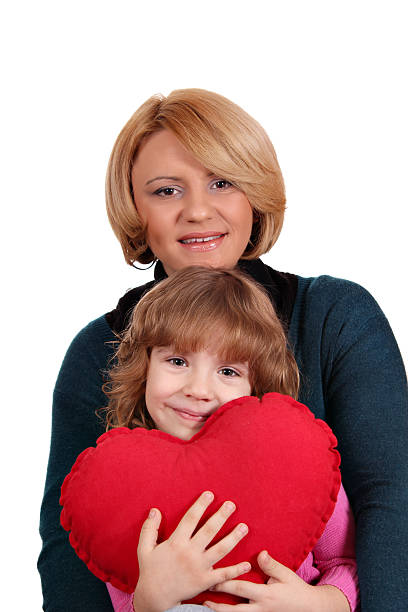 istock happy mother and daughter with heart 160308283