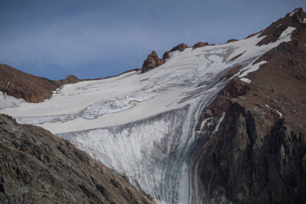 istock mountains covered with snowy rocks 1603087815