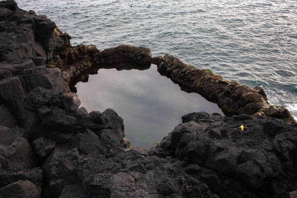 istock Brimketill lava rock pool 1603108529