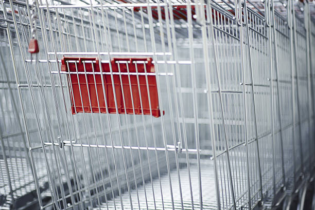 Part of parked empty shopping carts stock photo