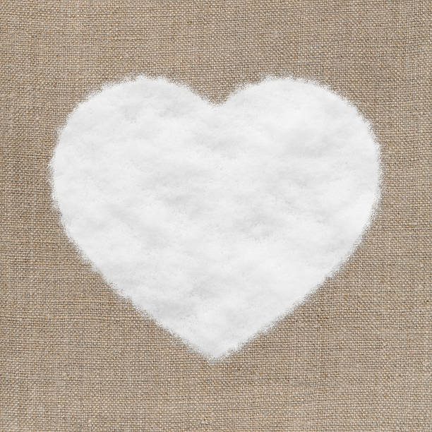 istock heart shape made of textile and snow 160311565