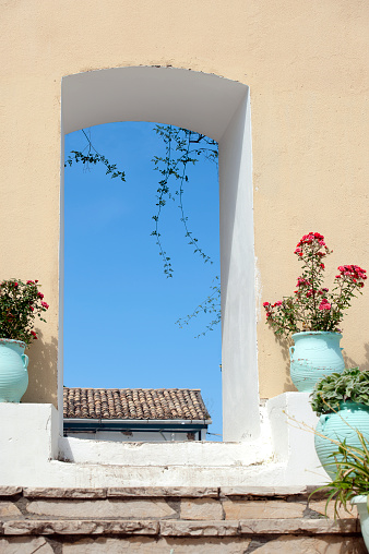 Colourful house wall facade, house with green door and shutters, Provence village, south France