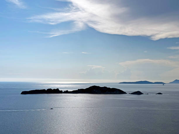 istock Dusk over islands near Arillas, North Corfu, Greece 1603124471