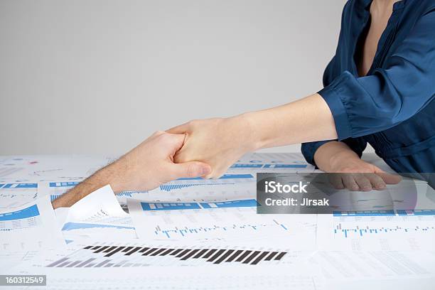 Helping Hand Against Bureaucracy Stock Photo - Download Image Now - Drowning, Paper, Assistance