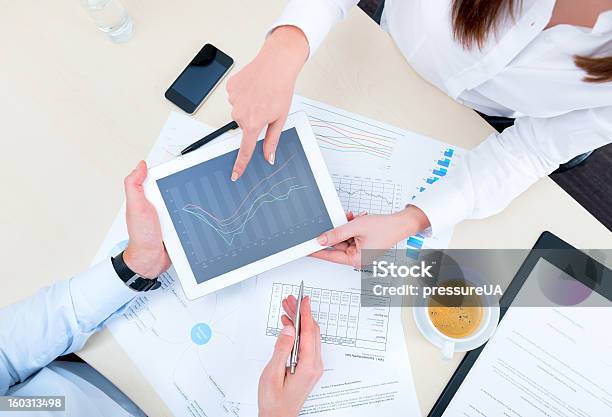 Discussion Of Strategy With A Financial Analyst Stock Photo - Download Image Now - Financial Analyst, Service, Financial Report