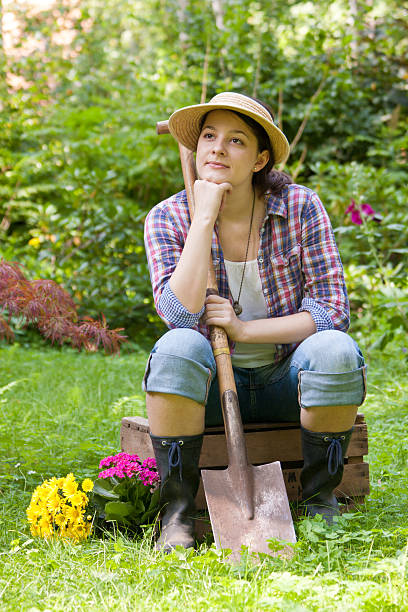 istock young woman in a garden 160314944
