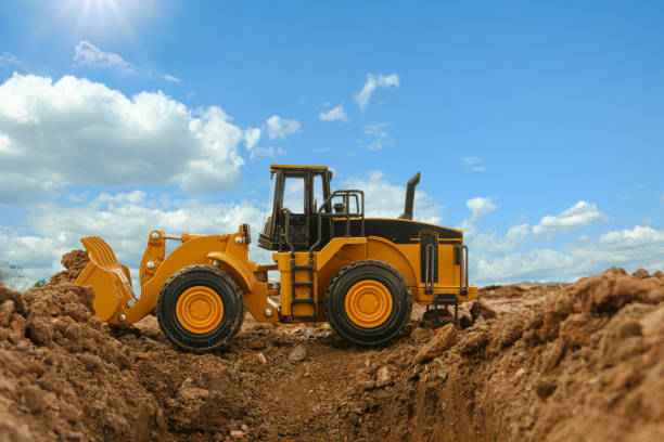 istock Wheel loader are digging the soil in the construction site . 1603164622