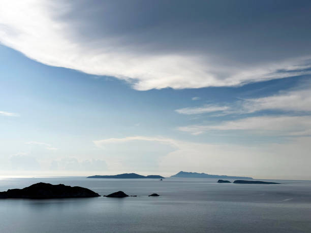 istock Sunset and dramatic clouds over Arillas, North Corfu, Greece 1603172478