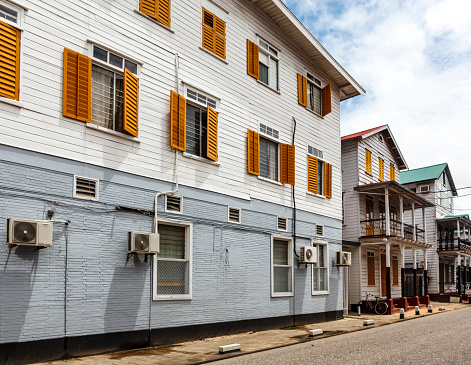 Facade of an old white wooden house in the historic center of Paramaribo, Suriname, South America