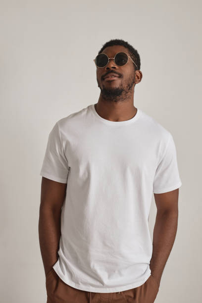 istock Handsome black man wearing sunglasses on white 1603179043