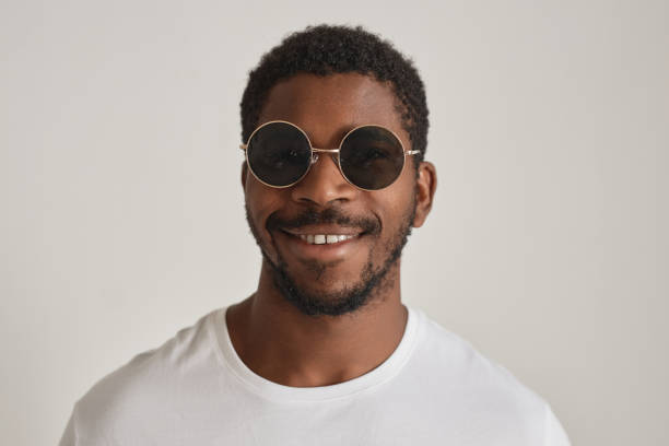 istock Black man with sunglasses minimal 1603179060