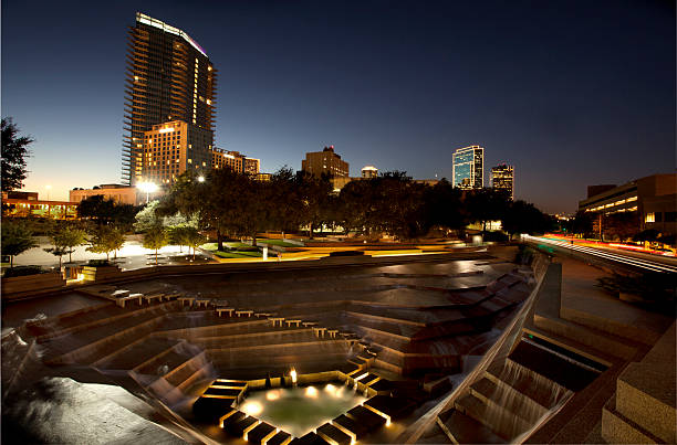 Ft Worth water gardens top view Nighttime view of downtown Ft Worth, Texas with the famous Water Garden in the foreground. water garden stock pictures, royalty-free photos & images