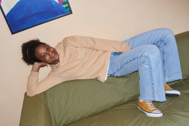 black girl wearing casual clothes indoors with flash - pre teen boy flash imagens e fotografias de stock