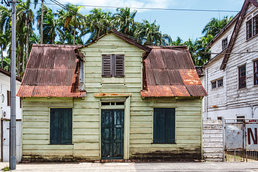 Facade of an old wooden house in the historic center of Paramaribo, Suriname, South America