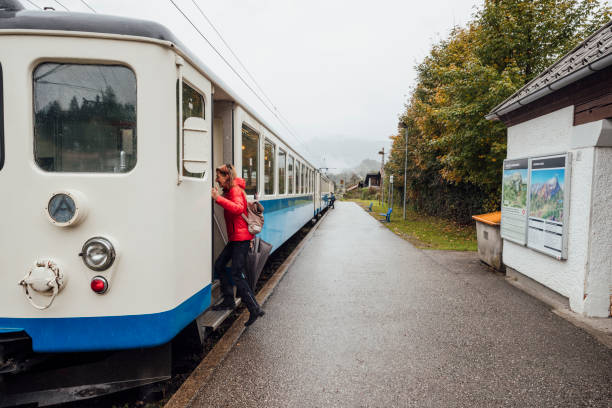 istock Mature Female Woman Getting on Commuter Train 1603217309