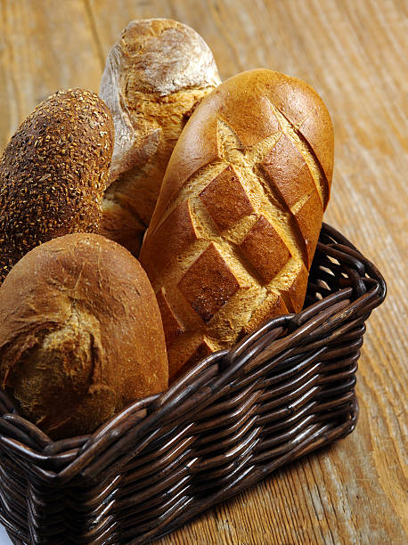 istock Loaves of bread in a basket 160321891