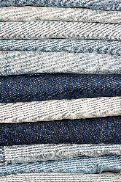 istock Pile of blue jeans 160324443