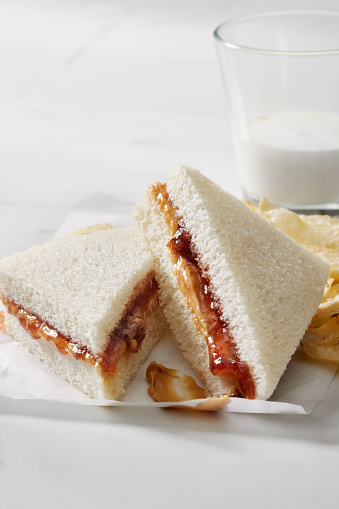 Peanut Butter and Strawberry Jam Tea Sandwich with Kettle Potato Chips
