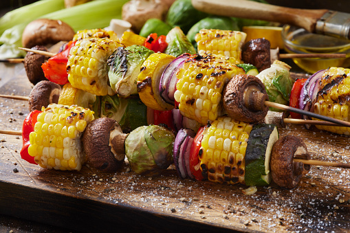 Grilled Vegetable Kebabs with Corn on the Cob, Yellow and Green Zucchini, Mushrooms, Red Onions and Red Peppers
