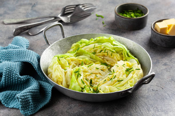 stewed steamed cabbage with butter, healthy vegetarian food stewed steamed cabbage with butter, healthy vegetarian food braised stock pictures, royalty-free photos & images