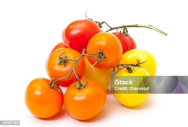 Tomates Maduros Frescos Multicolored Foto de stock y más banco de imágenes de Alimento - Alimento, Amarillo - Color, Brillante