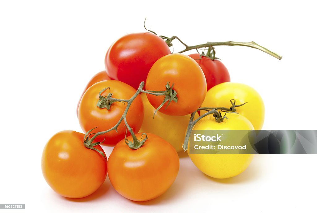 Pomodori freschi maturi multicolore - Foto stock royalty-free di Alimentazione sana
