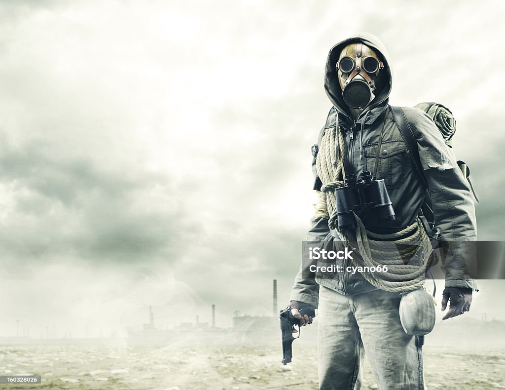 Environmental disaster Environmental disaster. Post apocalyptic survivor in gas mask Gas Mask Stock Photo